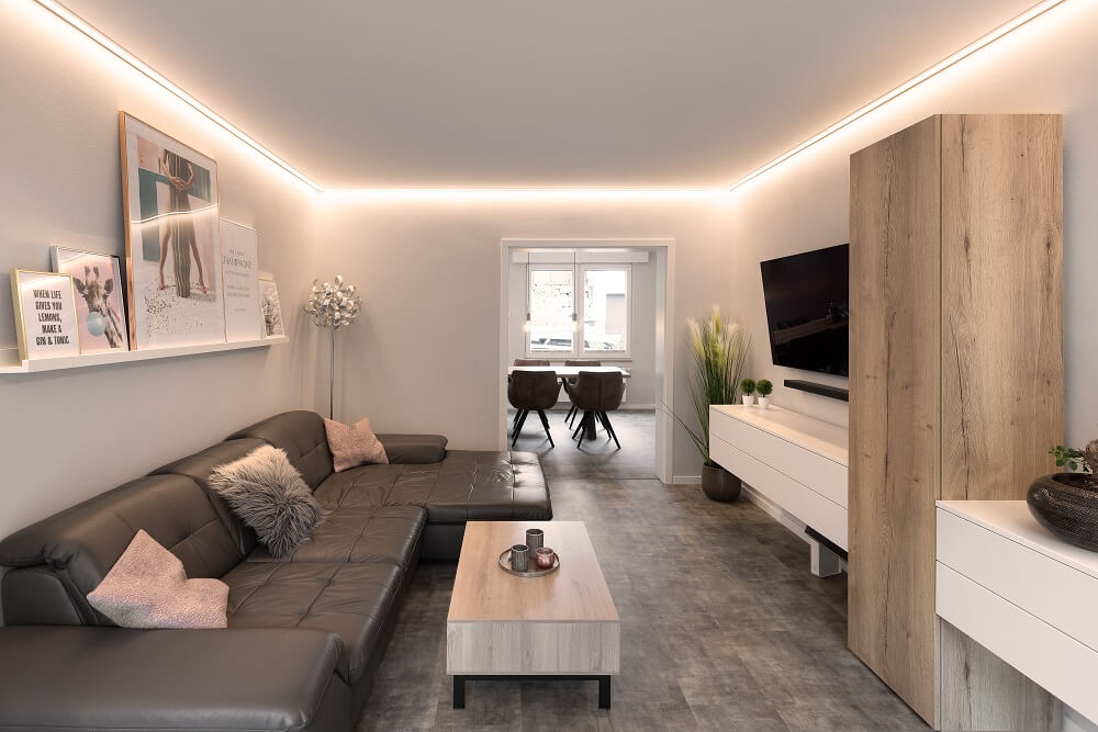 Plameco spanplafond: Plafondontwerp in de woonkamer met lichtgrijs spanplafond en led-strip.